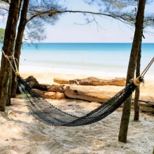 hammock between trees secret beach borneo