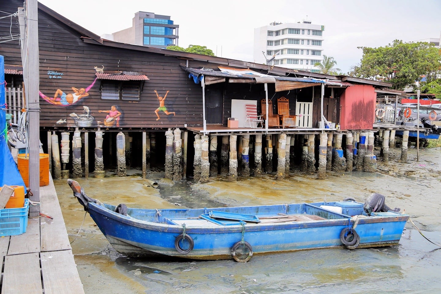 blue boat at Chew Jetty