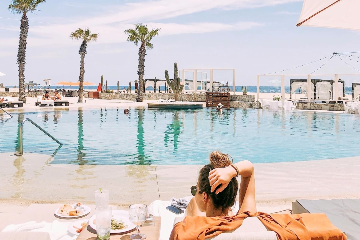 woman at beach resort in Los Cabos