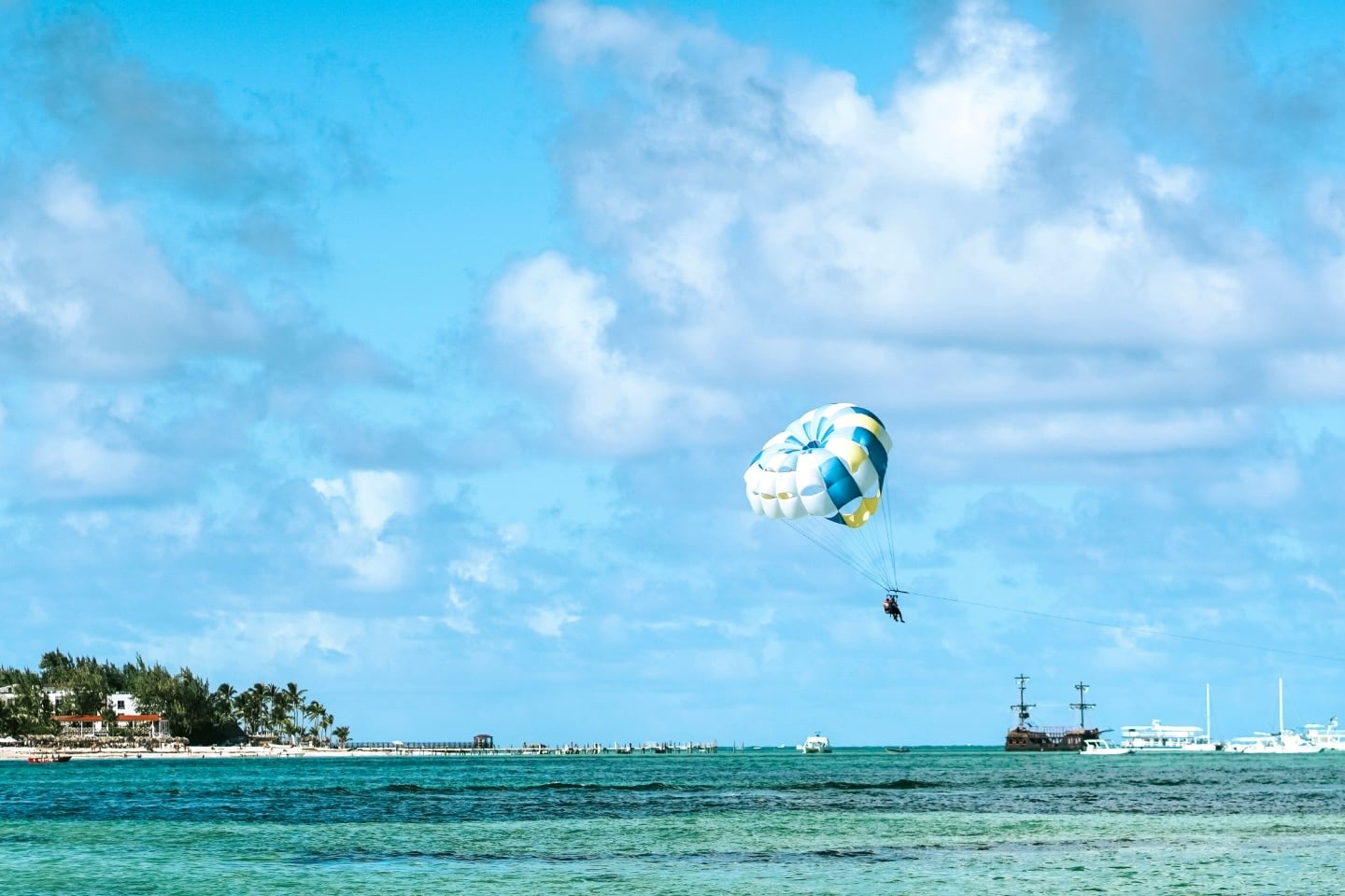 parasailing over the Caribbean Sea in Punta Cana