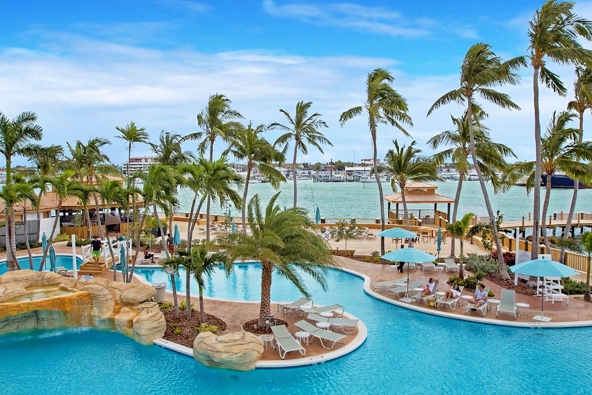 palm trees around resort pool in the Bahamas