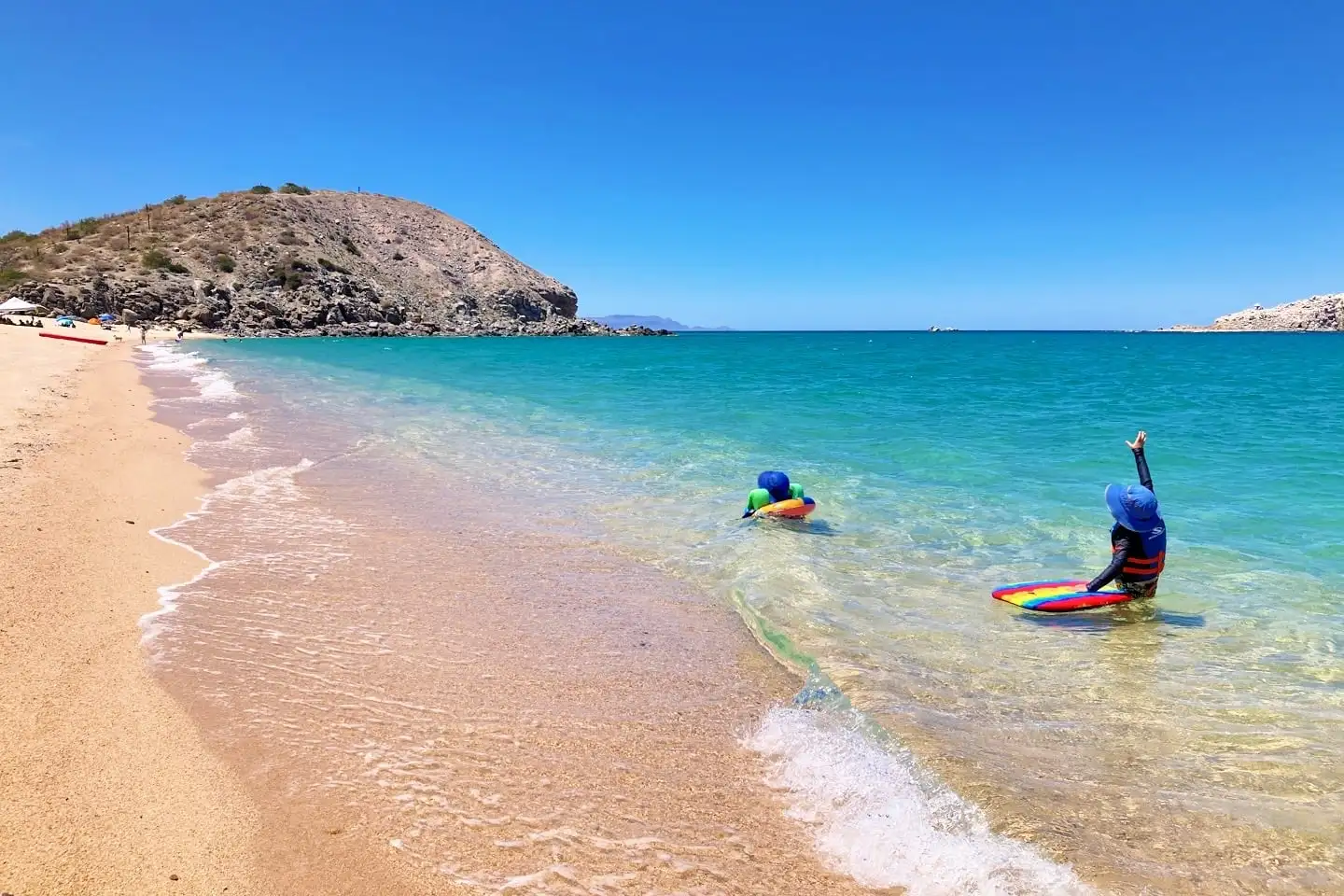 kids playing at Playa Saltito La Paz beaches