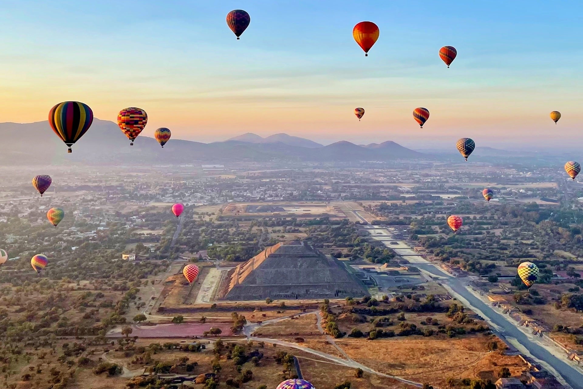 hot air balloons over Teotihuacan pyramid near Mexico City